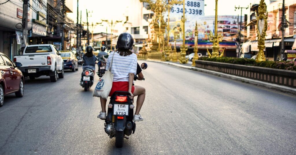 woman with motorcycle helmet