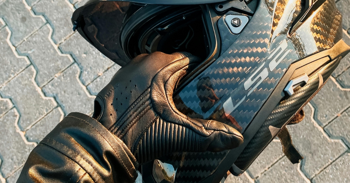 motorcycle gloves and helmet