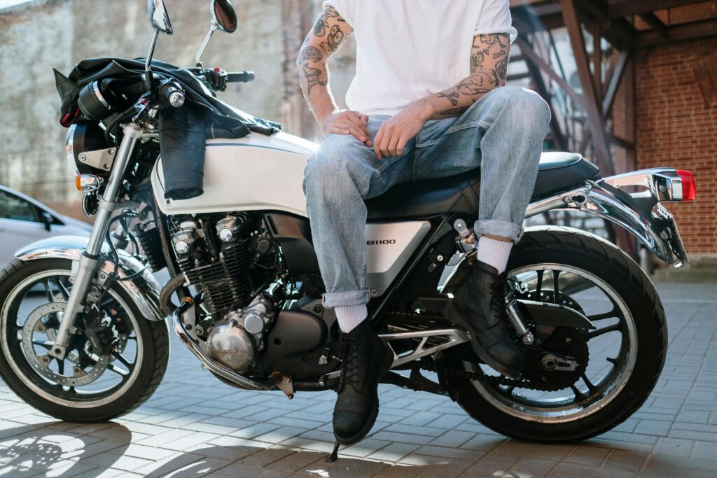 man on motorcycle with riding boots