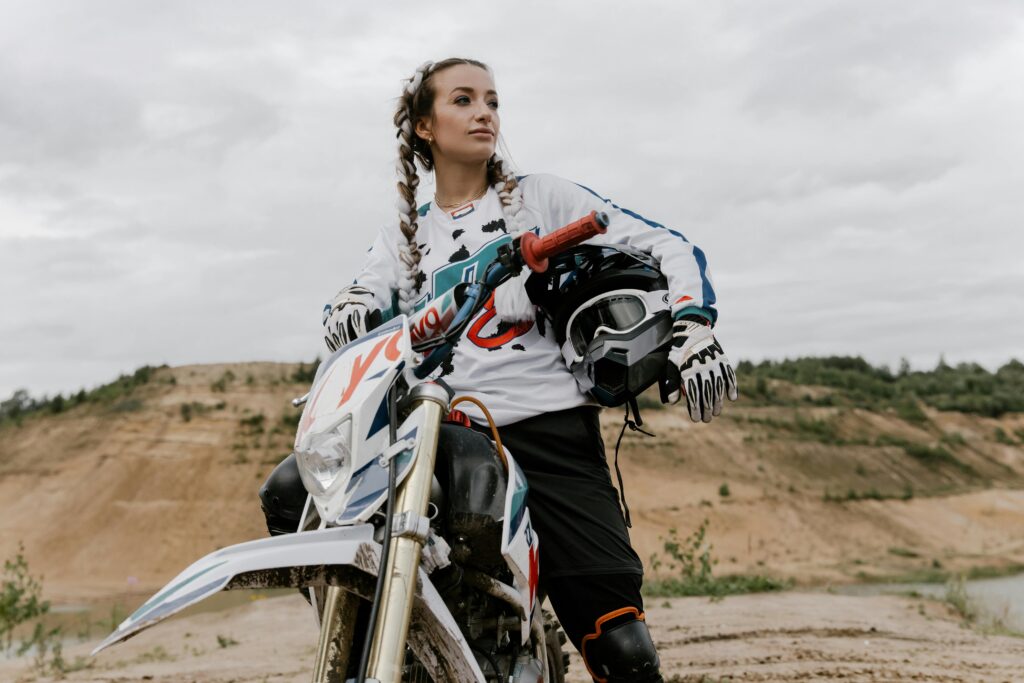 woman holding helmet
